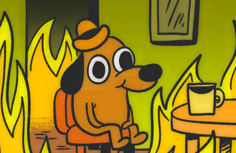 A dog sitting in fire.